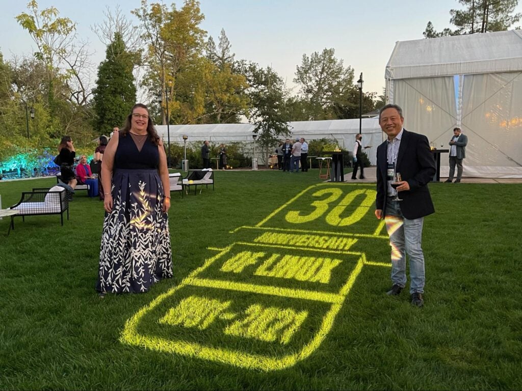 Outside the LFMS event tent, at dusk, on the grass