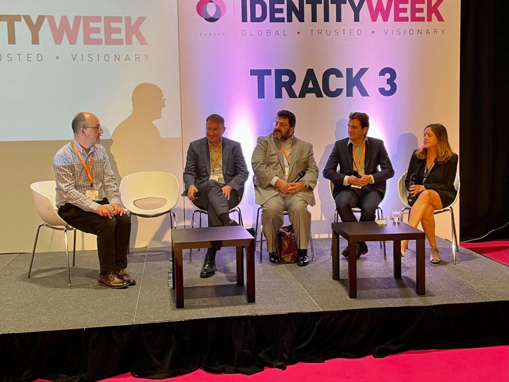 Five panellists sitting on a stage for Identity Week 2022